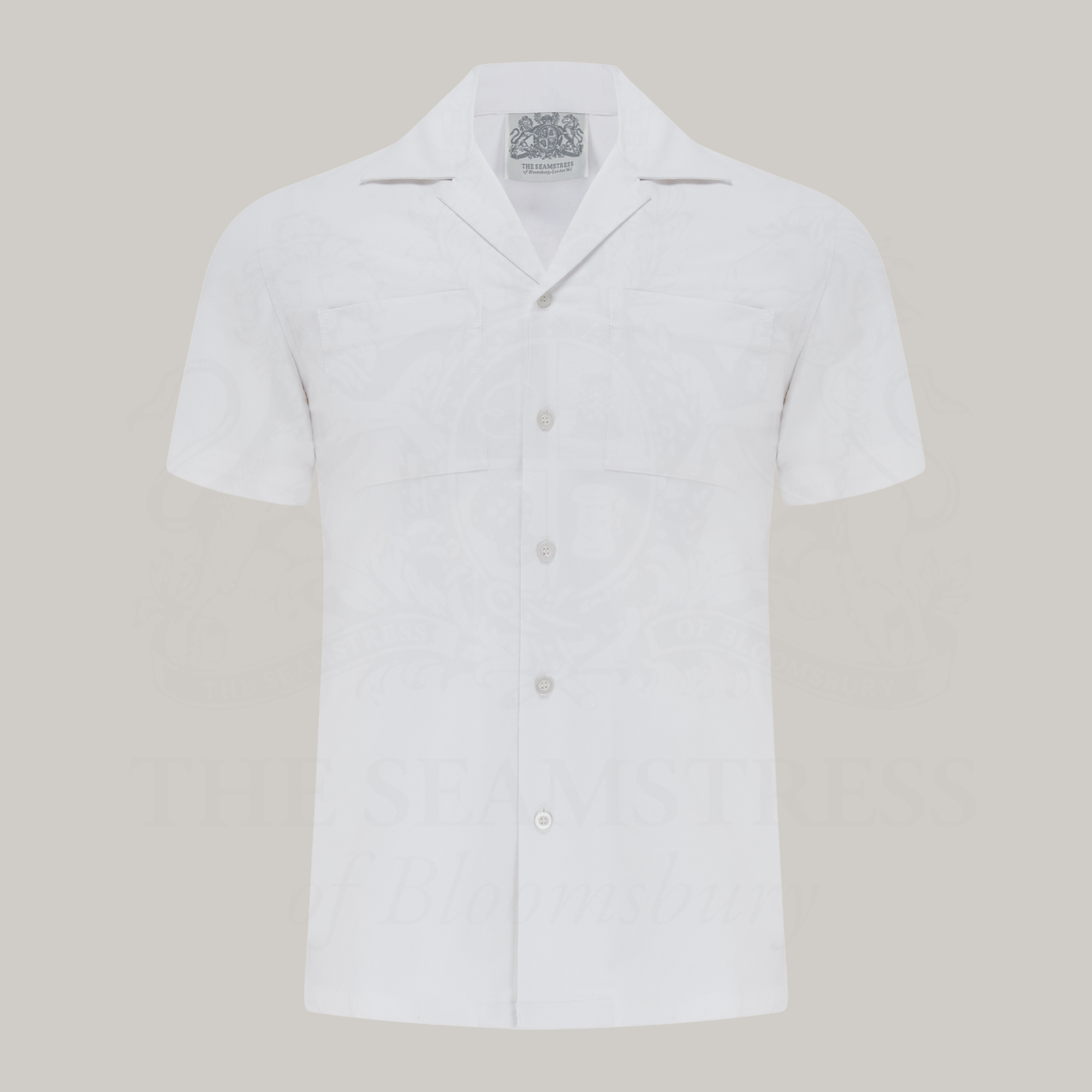 White short-sleeve shirt on a grey background