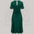 A 1940s vintage style short sleeve dress with a side tie-neck and a tie-waist belt. This dress is in a dark green colour and has a a-line skirt and is designed to finish below the knee.