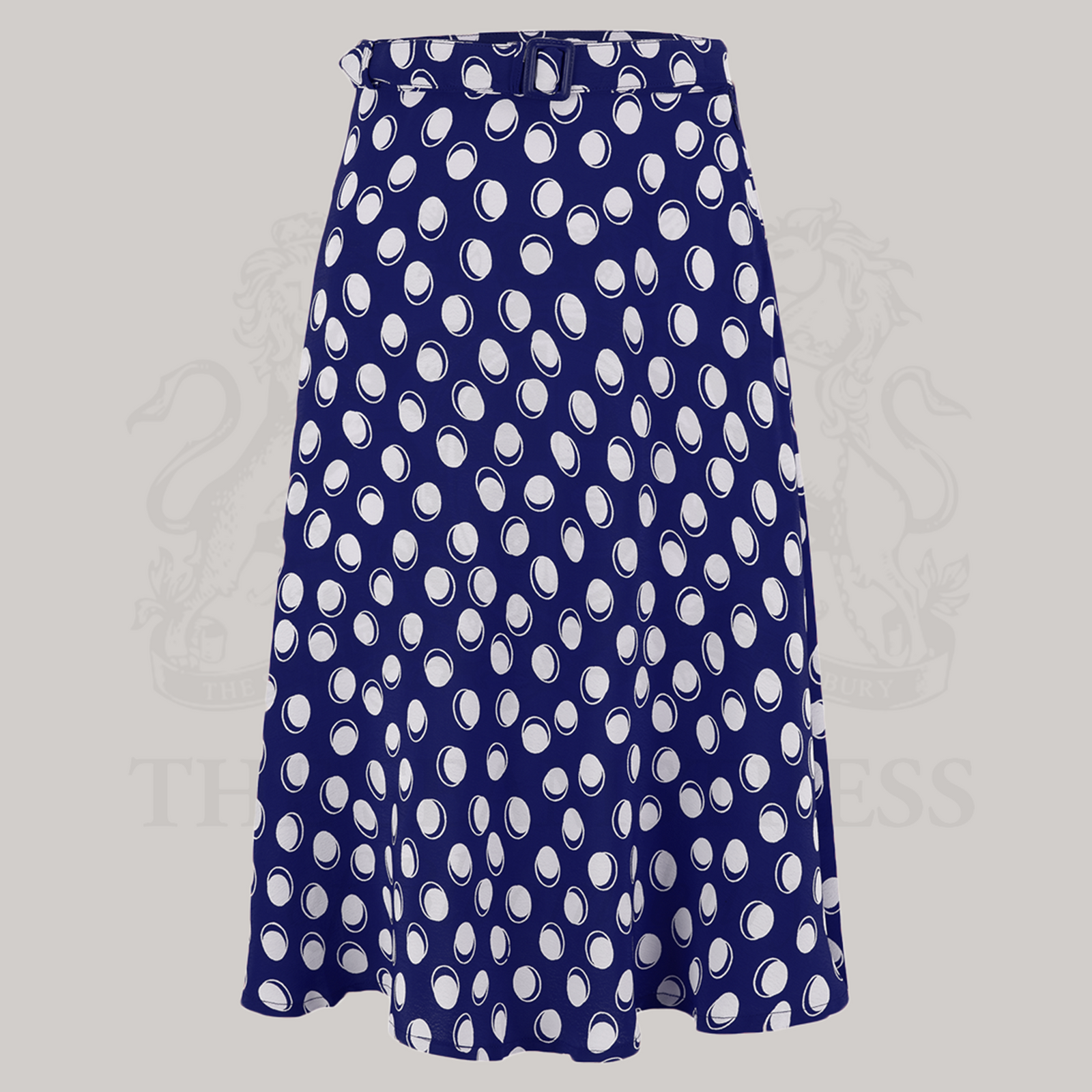 A 1940s-style swing dancing skirt in navy blue with large polka dots. The skirt comes with a self-coloured waist belt. 