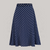 A 1940s-style swing dancing skirt in navy blue with polka dots. The skirt comes with a self-coloured waist belt. 
