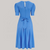 A 1940s-style short-sleeve dress in blue. Featuring a sweetheart neckline, smocking detailing, pockets, and a waist tie.
