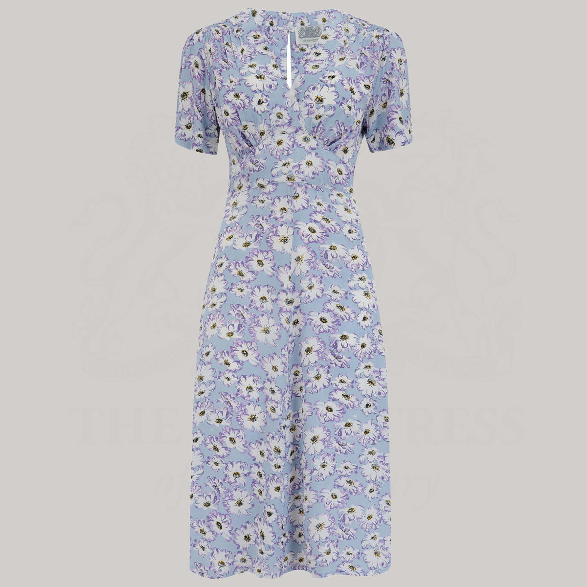 a 1940s-style dance dress in pale blue with a cream floral pattern