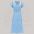 1940s-inspired shirtdress in pale blue with contrasting cream collar and bodice buttons.