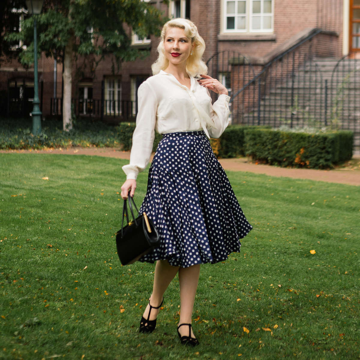 Lucille Pleated Skirt in Navy Polka