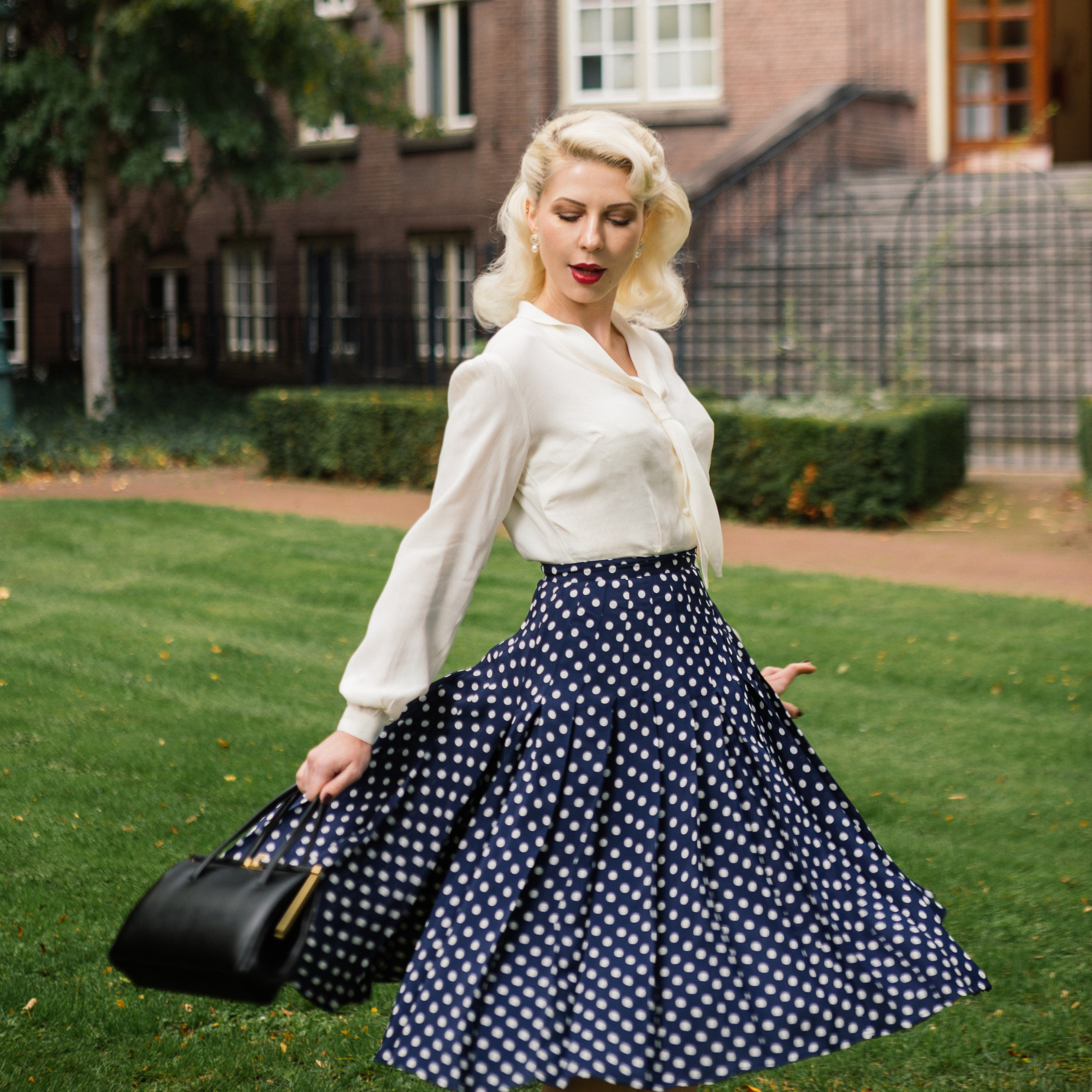 Lucille Pleated Skirt in Navy Polka