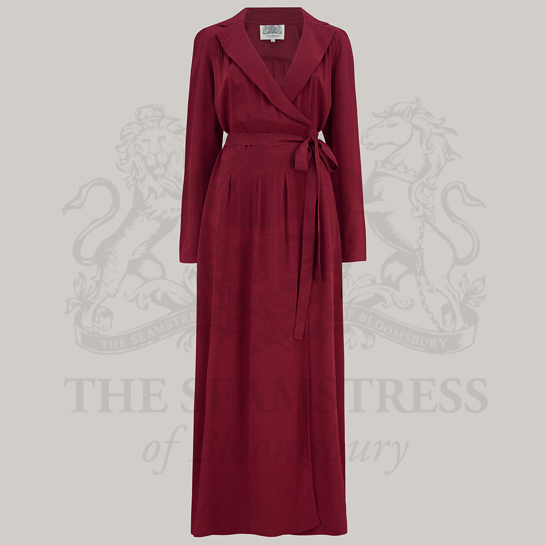 1940s style wrap burguny pyjamas. Consists of a full length gown with a revere collar and tie wrap waist, and wide leg elasticated waist trousers. 