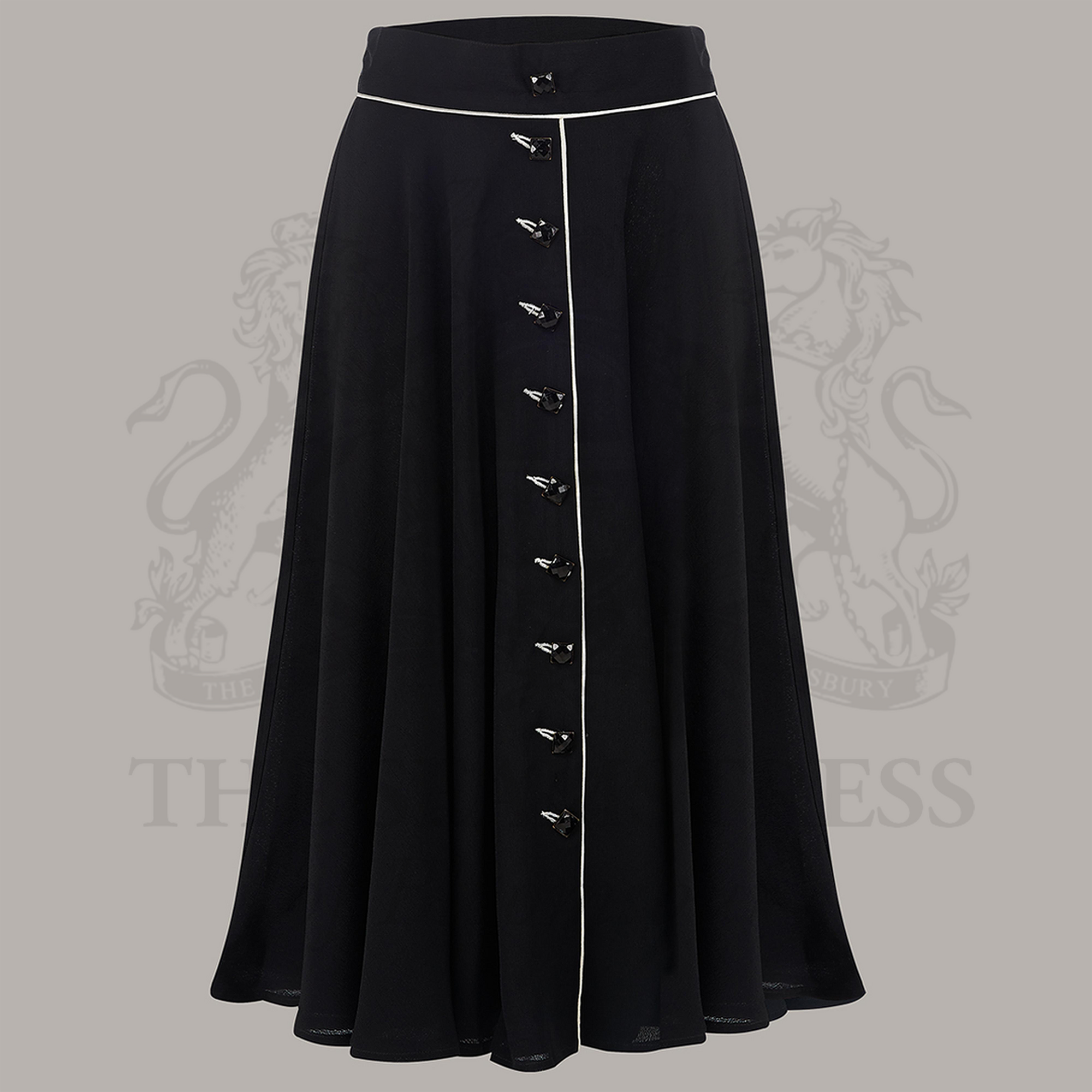 A swing skirt with diagonal cream contrasting buttonholes and jet-style buttons, in a natural, lightweight fabric with no stretch.