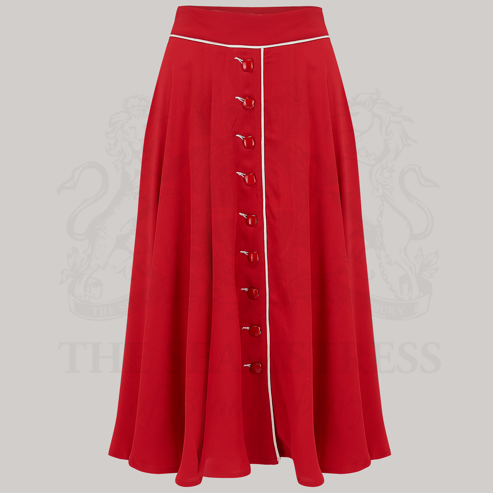 A red swing skirt with diagonal cream contrasting buttonholes and jet-style buttons, made of crepe de chine fabric.