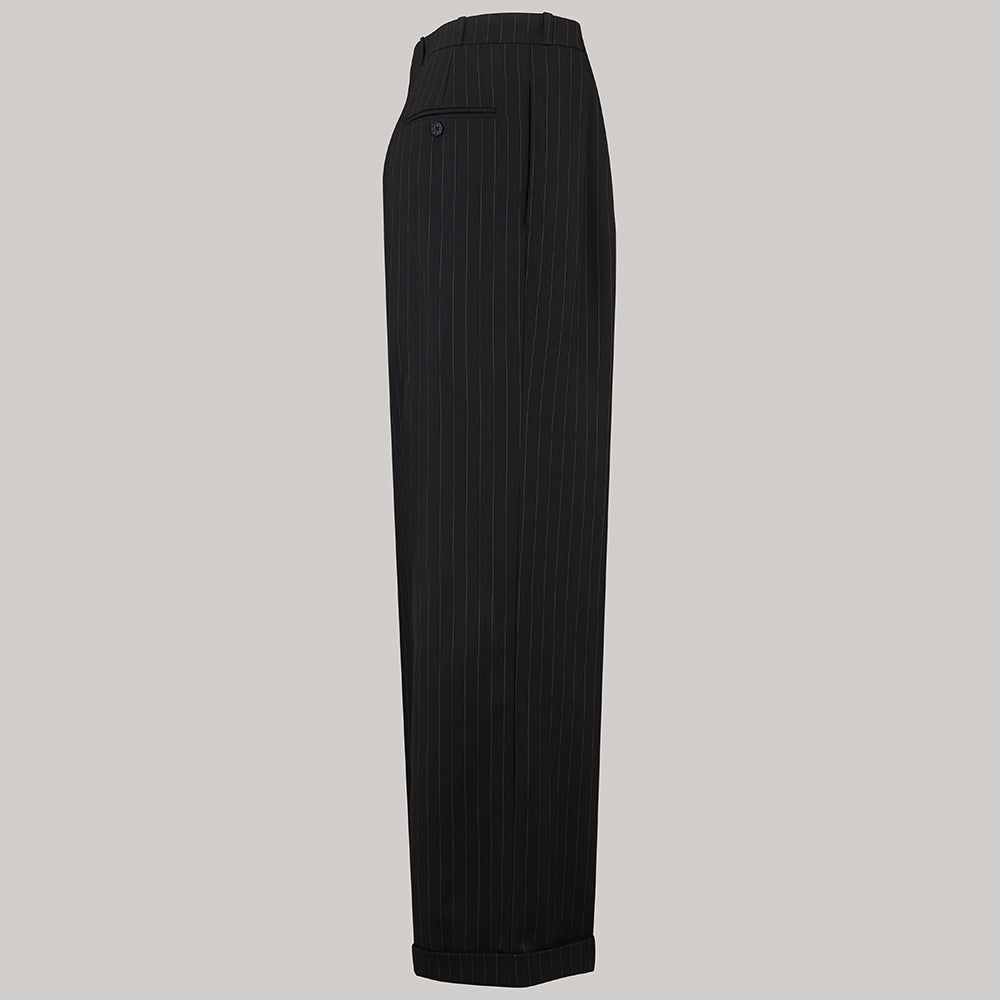 A pair of 1940s mens black pinstripe trousers on a grey background.