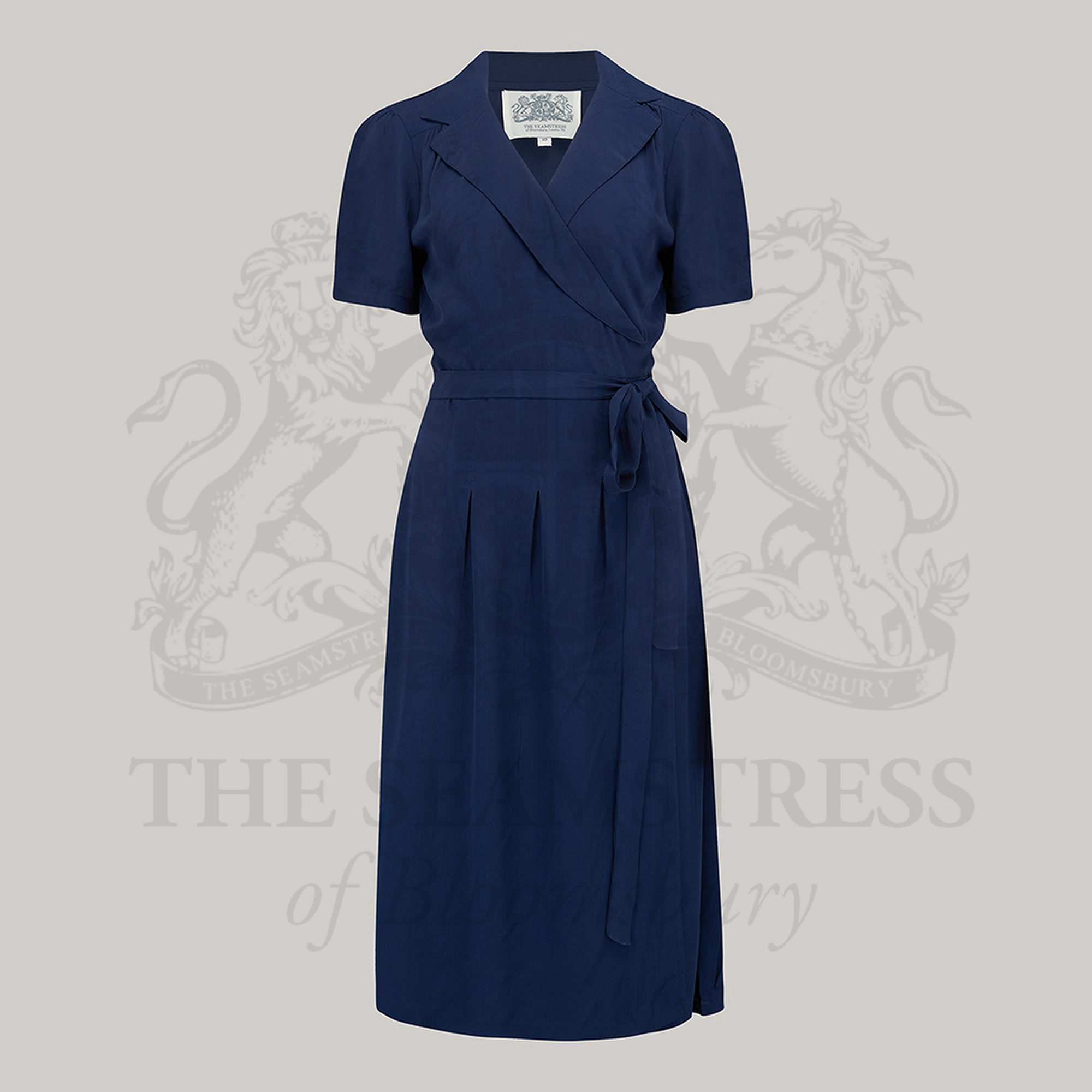 A navy blue wrap dress with short sleeves and a v-neck